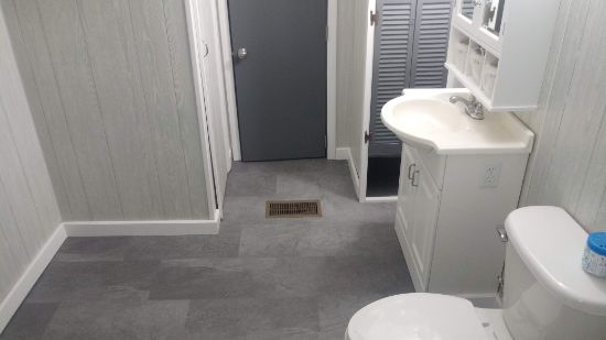 BATHROOM ON A SMALL BUDGET  NEW FLOOR NEW WALLS  CUSTOM DESIGN  USED VANITY  RE PURPOSED SHUTTERS MOUNT VERNON
